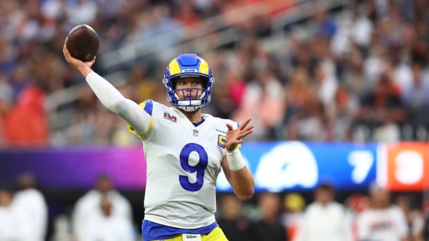 Feb 13, 2022; Inglewood, CA, USA; Los Angeles Rams quarterback Matthew Stafford (9) throws a touchdown pass to wide receiver Cooper Kupp (not pictured) against the Cincinnati Bengals during the second quarter in Super Bowl LVI at SoFi Stadium. Mandatory Credit: Mark J. Rebilas-USA TODAY Sports